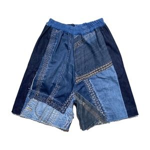 $1,165 Patchwork denim shorts